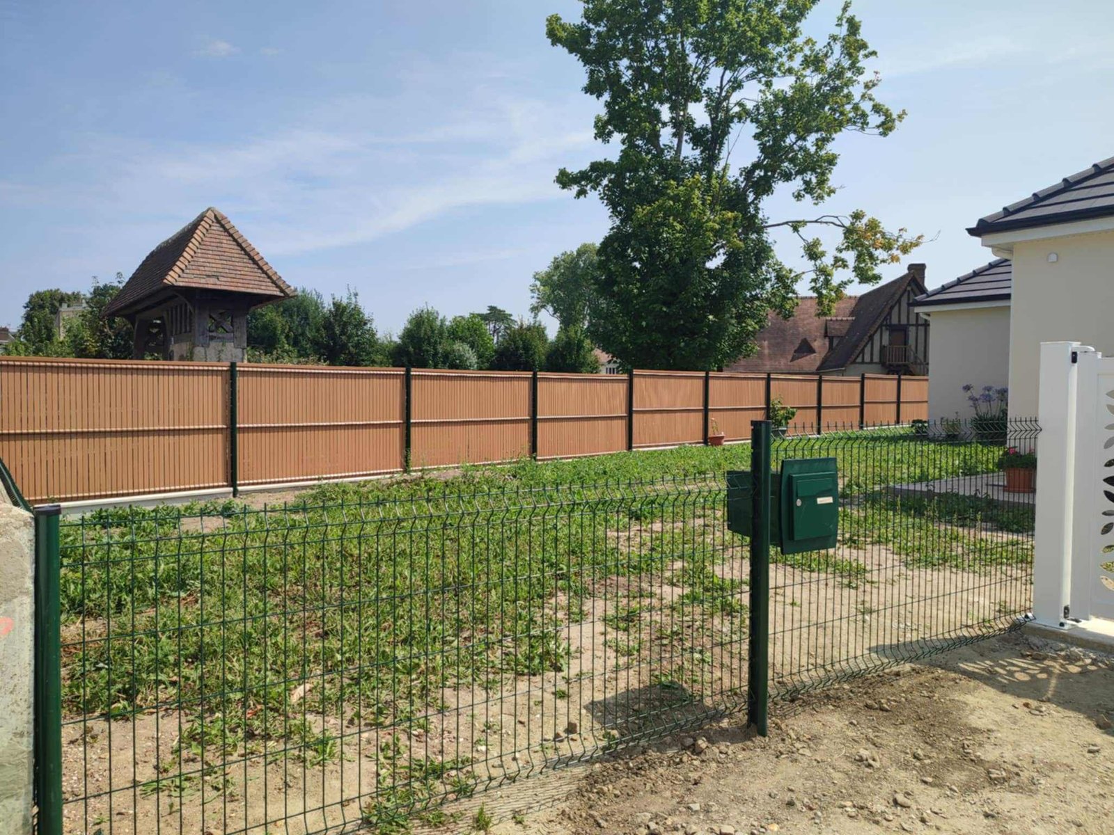 Clôture bois moderne installation artisanale